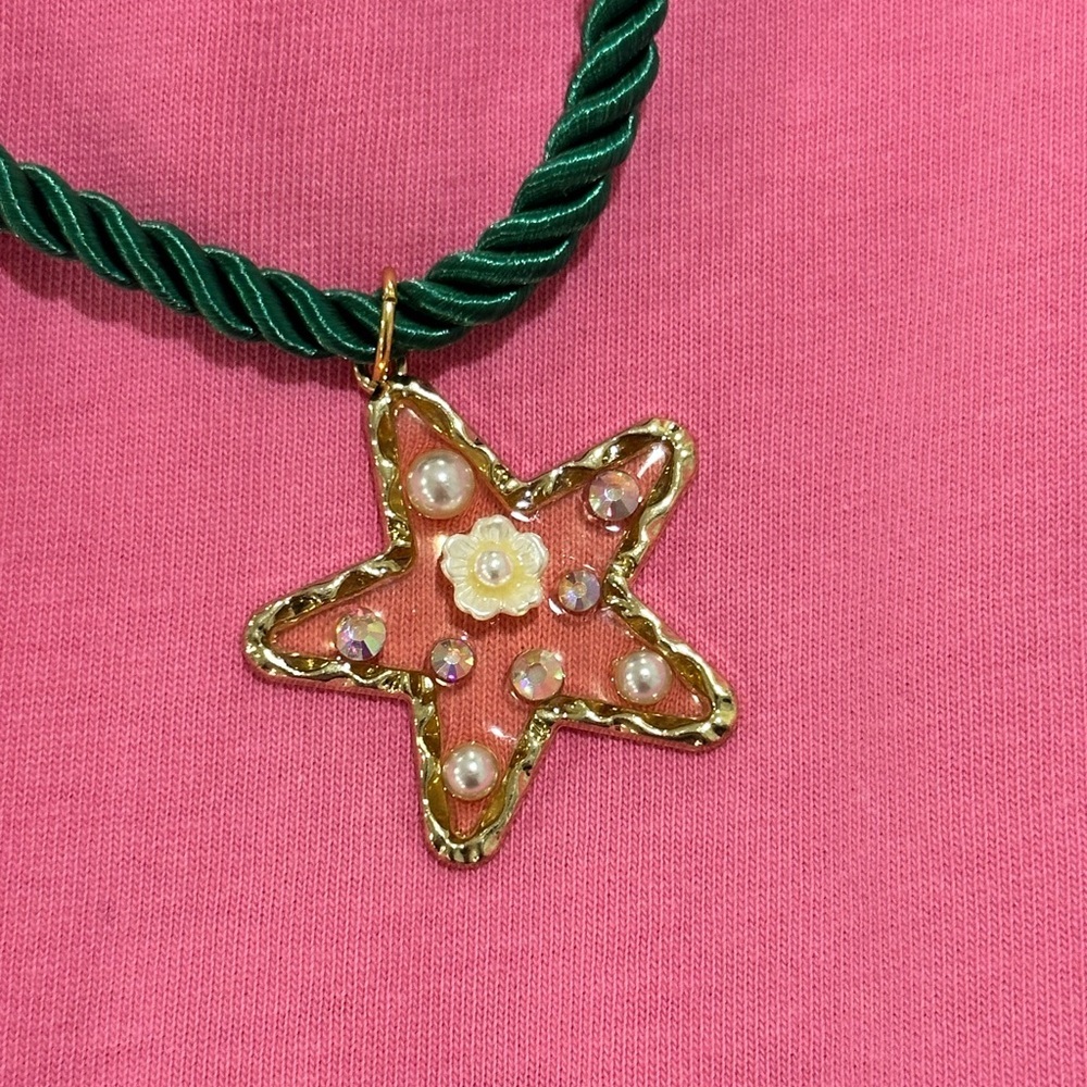 Golden Lily. (NWT) Elegant Green Cord with Gold Star pendant Necklace.